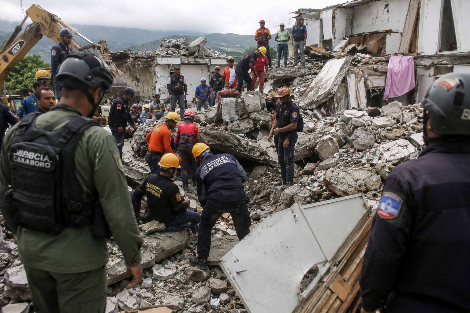 Rescue teams search through earthquake-damaged buildings in Venezuela as recovery operations continue.